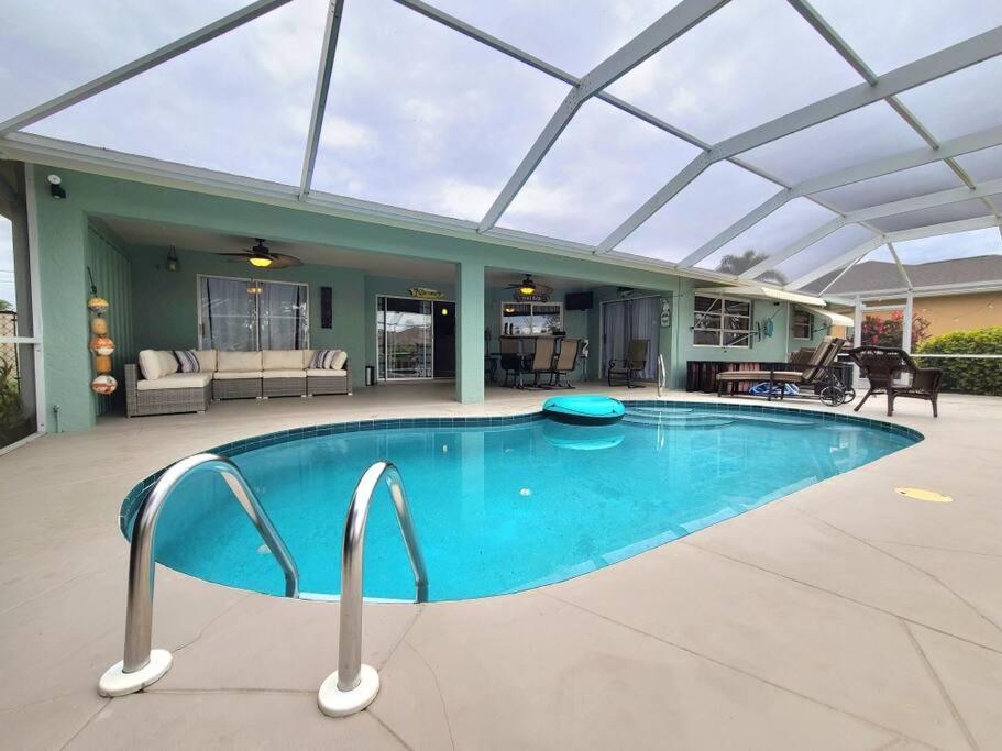 Tropical Breeze Canal Waterfront Home, Heated Pool Cape Coral